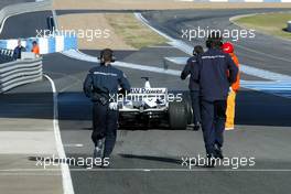 10.02.2006 Jerez, Spain,  Robert Kubica (POL), Test Driver, BMW Sauber F1 Team, stops at the pit exit
