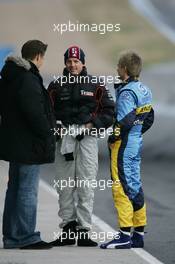 09.02.2006 Jerez, Spain,  Kimi Raikkonen (FIN) McLaren talks with Heikki Kovalainen (FIN) Renault Test Driver