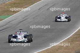 08.02.2006 Jerez, Spain,  Jacques Villeneuve (CDN), BMW Sauber F1 Team, leads team mate Nick Heidfeld (GER), BMW Sauber F1 Team