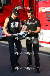 11.10.2006 Jerez, Spain,  Michael Schumacher (GER), Scuderia Ferrari, signs an autograph, F1 Testing