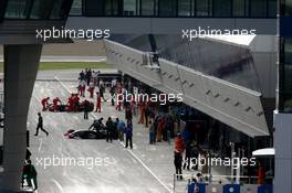 07.12.2006 Jerez, Spain,  Lewis Hamilton (GBR), McLaren Mercedes in a busy pitlane - F1 Testing