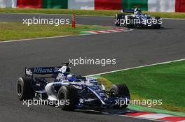 08.10.2006 Suzuka, Japan,  Nico Rosberg (GER), WilliamsF1 Team, FW28 Cosworth and Mark Webber (AUS), Williams F1 Team, FW28 Cosworth - Formula 1 World Championship, Rd 17, Japanese Grand Prix, Sunday Race