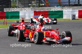 08.10.2006 Suzuka, Japan,  Felipe Massa (BRA), Scuderia Ferrari, 248 F1 leads Michael Schumacher (GER), Scuderia Ferrari, 248 F1 - Formula 1 World Championship, Rd 17, Japanese Grand Prix, Sunday Race