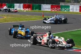 08.10.2006 Suzuka, Japan,  Jenson Button (GBR), Honda Racing F1 Team, RA106, Giancarlo Fisichella (ITA), Renault F1 Team, R26 - Formula 1 World Championship, Rd 17, Japanese Grand Prix, Sunday Race
