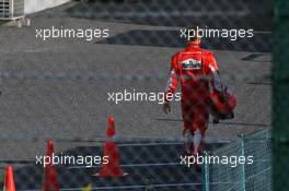 08.10.2006 Suzuka, Japan,  Michael Schumacher (GER), Scuderia Ferrari gets a lift to the paddock after retiring from the race - Formula 1 World Championship, Rd 17, Japanese Grand Prix, Sunday Race