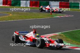 08.10.2006 Suzuka, Japan,  Ralf Schumacher (GER), Toyota Racing, TF106 and Jarno Trulli (ITA), Toyota Racing, TF106 - Formula 1 World Championship, Rd 17, Japanese Grand Prix, Sunday Race