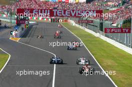 08.10.2006 Suzuka, Japan,  Rubens Barrichello (BRA), Honda Racing F1 Team, RA106 and Nico Rosberg (GER), WilliamsF1 Team, FW28 Cosworth, Robert Kubica (POL), BMW Sauber F1 Team, F1.06 - Formula 1 World Championship, Rd 17, Japanese Grand Prix, Sunday Race