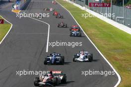 08.10.2006 Suzuka, Japan,  Rubens Barrichello (BRA), Honda Racing F1 Team, RA106 and Nico Rosberg (GER), WilliamsF1 Team, FW28 Cosworth - Formula 1 World Championship, Rd 17, Japanese Grand Prix, Sunday Race