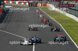 08.10.2006 Suzuka, Japan,  Robert Kubica (POL), BMW Sauber F1 Team, F1.06, Nico Rosberg (GER), WilliamsF1 Team, FW28 Cosworth, Mark Webber (AUS), Williams F1 Team, FW28 Cosworth - Formula 1 World Championship, Rd 17, Japanese Grand Prix, Sunday Race