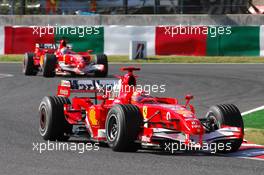 08.10.2006 Suzuka, Japan,  Michael Schumacher (GER), Scuderia Ferrari, 248 F1 leads Felipe Massa (BRA), Scuderia Ferrari, 248 F1 - Formula 1 World Championship, Rd 17, Japanese Grand Prix, Sunday Race