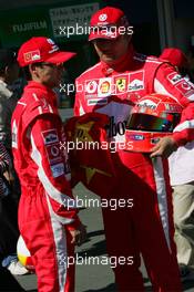 07.10.2006 Suzuka, Japan,  Two men dressed as Michael Schumacher (GER), Scuderia Ferrari - Formula 1 World Championship, Rd 17, Japanese Grand Prix, Saturday