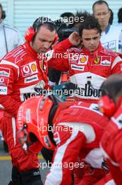 07.10.2006 Suzuka, Japan,  Felipe Massa (BRA), Scuderia Ferrari gets pole position and watched Michael Schumacher get out of his car - Formula 1 World Championship, Rd 17, Japanese Grand Prix, Saturday Qualifying