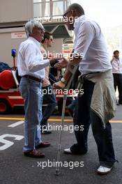 26.05.2006 Monte Carlo, Monaco,  Michel Comte, fashion photograhper talking with Bernie Ecclestone (GBR) - Formula 1 World Championship, Rd 7, Monaco Grand Prix, Friday