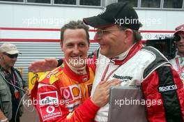 28.05.2006 Monte Carlo, Monaco,  Michael Schumacher (GER), Scuderia Ferrari and Kees van de Grint (NED), Bridgestone Tyre Engineer- Formula 1 World Championship, Rd 7, Monaco Grand Prix, Sunday Podium