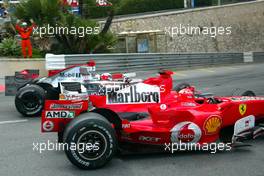 28.05.2006 Monte Carlo, Monaco,  Michael Schumacher (GER), Scuderia Ferrari and Kimi Raikkonen (FIN), Räikkönen, McLaren Mercedes - Formula 1 World Championship, Rd 7, Monaco Grand Prix, Sunday Race