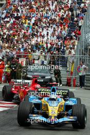 28.05.2006 Monte Carlo, Monaco,  Fernando Alonso (ESP), Renault F1 Team, in the new R26 and Michael Schumacher (GER), Scuderia Ferrari - Formula 1 World Championship, Rd 7, Monaco Grand Prix, Sunday Race