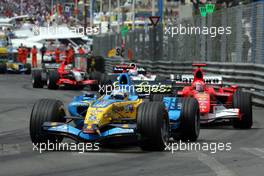 28.05.2006 Monte Carlo, Monaco,  Fernando Alonso (ESP), Renault F1 Team, in the new R26 ahead of Michael Schumacher (GER), Scuderia Ferrari - Formula 1 World Championship, Rd 7, Monaco Grand Prix, Sunday Race