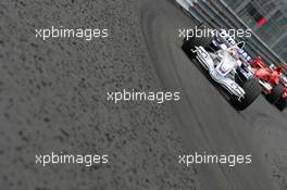 28.05.2006 Monte Carlo, Monaco,  Jacques Villeneuve (CDN), BMW Sauber F1 Team, F1.06 drives past the tyre marbles - Formula 1 World Championship, Rd 7, Monaco Grand Prix, Sunday Race