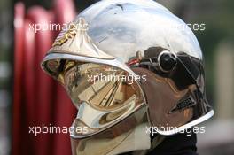 28.05.2006 Monte Carlo, Monaco,  Tiago Monteiro (POR), Midland MF1 Racing  in a reflexion of a fire men helmet - Formula 1 World Championship, Rd 7, Monaco Grand Prix, Sunday Race