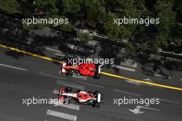 28.05.2006 Monte Carlo, Monaco,  Michael Schumacher (GER), Scuderia Ferrari and Christijan Albers (NED), Midland MF1 Racing  - Formula 1 World Championship, Rd 7, Monaco Grand Prix, Sunday Race