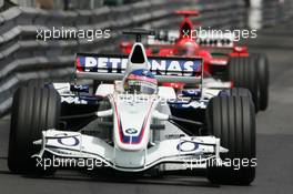 28.05.2006 Monte Carlo, Monaco,  Jacques Villeneuve (CDN), BMW Sauber F1 Team, F1.06 leads Michael Schumacher (GER), Scuderia Ferrari, 248 F1 - Formula 1 World Championship, Rd 7, Monaco Grand Prix, Sunday Race