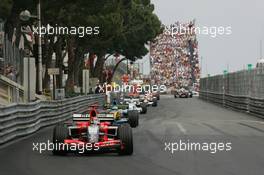 28.05.2006 Monte Carlo, Monaco,  Tiago Monteiro (POR), Midland MF1 Racing, Toyota M16 leads Giancarlo Fisichella (ITA), Renault F1 Team, R26 - Formula 1 World Championship, Rd 7, Monaco Grand Prix, Sunday Race