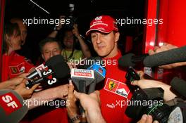 27.05.2006 Monte Carlo, Monaco,  Michael Schumacher (GER), Scuderia Ferrari, giving a press announcement at 9.42pm - Formula 1 World Championship, Rd 7, Monaco Grand Prix, Saturday