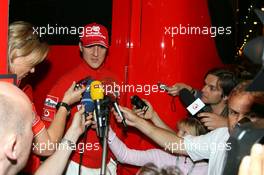 27.05.2006 Monte Carlo, Monaco,  Michael Schumacher (GER), Scuderia Ferrari giving an press announcement at 9.42pm to the media - Formula 1 World Championship, Rd 7, Monaco Grand Prix, Saturday