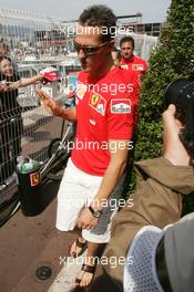 27.05.2006 Monte Carlo, Monaco,  Michael Schumacher (GER), Scuderia Ferrari on the way to the marshals / in the back Jean Todt (FRA), Scuderia Ferrari, Teamchief, General Manager, Team Principal - Formula 1 World Championship, Rd 7, Monaco Grand Prix, Saturday