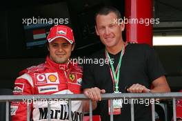 25.05.2006 Monte Carlo, Monaco,  Lance Edward Armstrong (USA) as a guest for Ferrari / AMD in the Ferrari garage / box and Felipe Massa (BRA), Scuderia Ferrari - Formula 1 World Championship, Rd 7, Monaco Grand Prix, Thursday