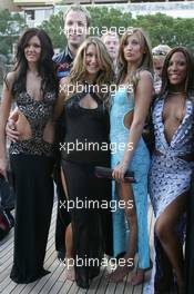 25.05.2006 Monte Carlo, Monaco,  Stars and Bars girls with Midland F1 Team members - Formula 1 World Championship, Rd 7, Monaco Grand Prix, Thursday