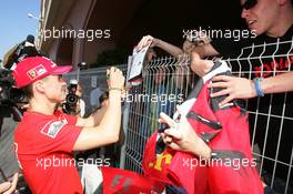 24.05.2006 Monte Carlo, Monaco,  Michael Schumacher (GER), Scuderia Ferrari, signs autographs for fans - Formula 1 World Championship, Rd 7, Monaco Grand Prix, Wednesday