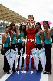 18.03.2006 Kuala Lumpur, Malaysia,  Grid Girl s with "Michael Schumacher (GER), Scuderia Ferrari" DOLL - Formula 1 World Championship, Rd 2, Malaysian Grand Prix, Saturday