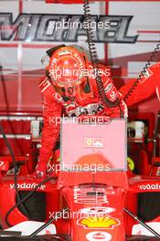 18.03.2006 Kuala Lumpur, Malaysia,  Michael Schumacher (GER), Scuderia Ferrari gets into the car - Formula 1 World Championship, Rd 2, Malaysian Grand Prix, Saturday Practice