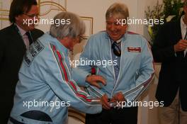 21.04.2006 Imola, Italy,  Bernie Ecclestone (GBR) and Herbie Blash (GBR), FIA observer in the retro jackets they once worn when they worked together at Brabham F1 - Formula 1 World Championship, Rd 4, San Marino Grand Prix, Friday