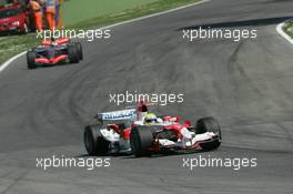 23.04.2006 Imola, Italy ** QIS, Quick Image Service ** April, Formula 1 World Championship, Rd 4, San Marino Grand Prix - Every used picture is fee-liable. - EDITORS PLEASE NOTE: QIS, Quick Image Service is a special service for electronic media. QIS images are uploaded directly by the photographer moments after the image has been taken. These images will not be captioned with a text describing what is visible on the picture. Instead they will have a generic caption indicating where and when they were taken. For editors needing a correct caption, the high resolution image (fully captioned) of the same picture will appear some time later on www.xpb.cc. The QIS images will be in low resolution (800 pixels longest side) and reduced to a minimum size (format and file size) for quick transfer. More info about QIS is available at www.xpb.cc - This service is offered by xpb.cc limited - c Copyright: xpb.cc limited  