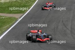 23.04.2006 Imola, Italy,  Juan-Pablo Montoya (COL), Juan Pablo, McLaren Mercedes, MP4-21 leads Kimi Raikkonen (FIN), Räikkönen, McLaren Mercedes, MP4-21 - Formula 1 World Championship, Rd 4, San Marino Grand Prix, Sunday Race