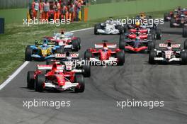 23.04.2006 Imola, Italy,  Michael Schumacher (GER), Scuderia Ferrari, 248 F1 leads the start of the race - Formula 1 World Championship, Rd 4, San Marino Grand Prix, Sunday Race