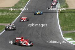 23.04.2006 Imola, Italy,  Michael Schumacher (GER), Scuderia Ferrari, 248 F1 leads the start of the race - Formula 1 World Championship, Rd 4, San Marino Grand Prix, Sunday Race