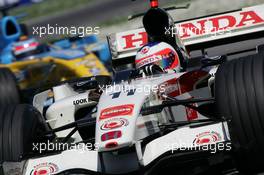 23.04.2006 Imola, Italy,  Rubens Barrichello (BRA), Honda Racing F1 Team, RA106  leads Giancarlo Fisichella (ITA), Renault F1 Team, R26 - Formula 1 World Championship, Rd 4, San Marino Grand Prix, Sunday Race