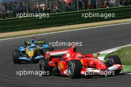 23.04.2006 Imola, Italy,  Michael Schumacher (GER), Scuderia Ferrari, 248 F1 leads Fernando Alonso (ESP), Renault F1 Team, R26 - Formula 1 World Championship, Rd 4, San Marino Grand Prix, Sunday Race