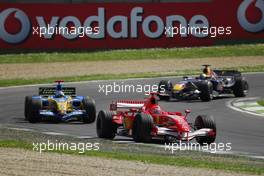 23.04.2006 Imola, Italy,  Michael Schumacher (GER), Scuderia Ferrari, 248 F1 leads Fernando Alonso (ESP), Renault F1 Team, R26 - Formula 1 World Championship, Rd 4, San Marino Grand Prix, Sunday Race