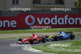 23.04.2006 Imola, Italy,  Michael Schumacher (GER), Scuderia Ferrari, 248 F1 leads Fernando Alonso (ESP), Renault F1 Team, R26 - Formula 1 World Championship, Rd 4, San Marino Grand Prix, Sunday Race