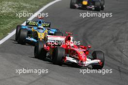 23.04.2006 Imola, Italy,  Michael Schumacher (GER), Scuderia Ferrari, 248 F1 leads Fernando Alonso (ESP), Renault F1 Team, R26 - Formula 1 World Championship, Rd 4, San Marino Grand Prix, Sunday Race