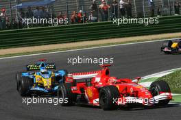 23.04.2006 Imola, Italy,  Michael Schumacher (GER), Scuderia Ferrari, 248 F1 leads Fernando Alonso (ESP), Renault F1 Team, R26 - Formula 1 World Championship, Rd 4, San Marino Grand Prix, Sunday Race