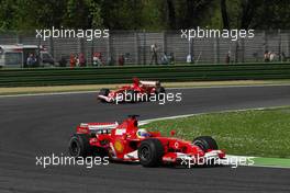 22.04.2006 Imola, Italy,  Felipe Massa (BRA), Scuderia Ferrari, 248 F1 leads Michael Schumacher (GER), Scuderia Ferrari, 248 F1 - Formula 1 World Championship, Rd 4, San Marino Grand Prix, Saturday Qualifying