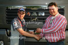 22.04.2006 Imola, Italy,  The General Director of MAN Truck & bus b.v Bert van Hasselt hands over the keys to the new Midland MAN trucks to Christijan Albers (NED), Midland MF1 Racing - Formula 1 World Championship, Rd 4, San Marino Grand Prix, Saturday