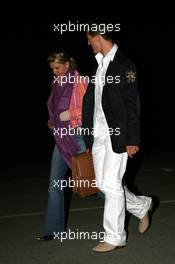 22.04.2006 Imola, Italy,  Corina Schumacher (GER), Corinna, Wife of Michael Schumacher and Michael Schumacher (GER), Scuderia Ferrari are leaving the track very late (8.50pm) - Formula 1 World Championship, Rd 4, San Marino Grand Prix, Saturday