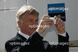 22.04.2006 Imola, Italy,  Max Mosley (GBR), FIA President taking a picture - Formula 1 World Championship, Rd 4, San Marino Grand Prix, Saturday