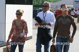 23.04.2006 Imola, Italy,  Corina Schumacher (GER), Corinna, Wife of Michael Schumacher arrives at the circuit with her left arm and hand in a bandage with Willi Weber (GER), Driver Manager and Michael Schumacher (GER), Scuderia Ferrari  - Formula 1 World Championship, Rd 4, San Marino Grand Prix, Sunday